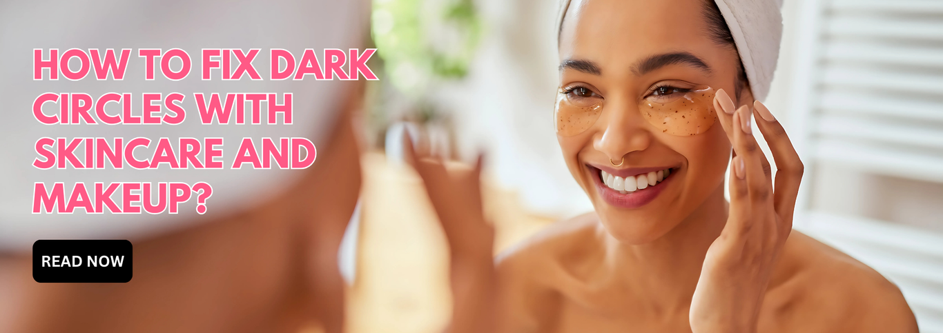 Smiling woman with a towel wrapped around her head applies under-eye patches while looking in the mirror. Bright pink text promotes a guide on fixing dark circles with skincare and makeup, accompanied by a 'Read Now' button.