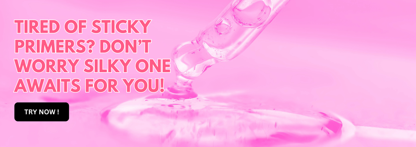 Close-up of a dropper dispensing a serum onto a smooth pink surface. Text reads: 'TIRED OF STICKY PRIMERS? DON'T WORRY SILKY ONE AWAITS FOR YOU!' A black 'Try Now' button is present.